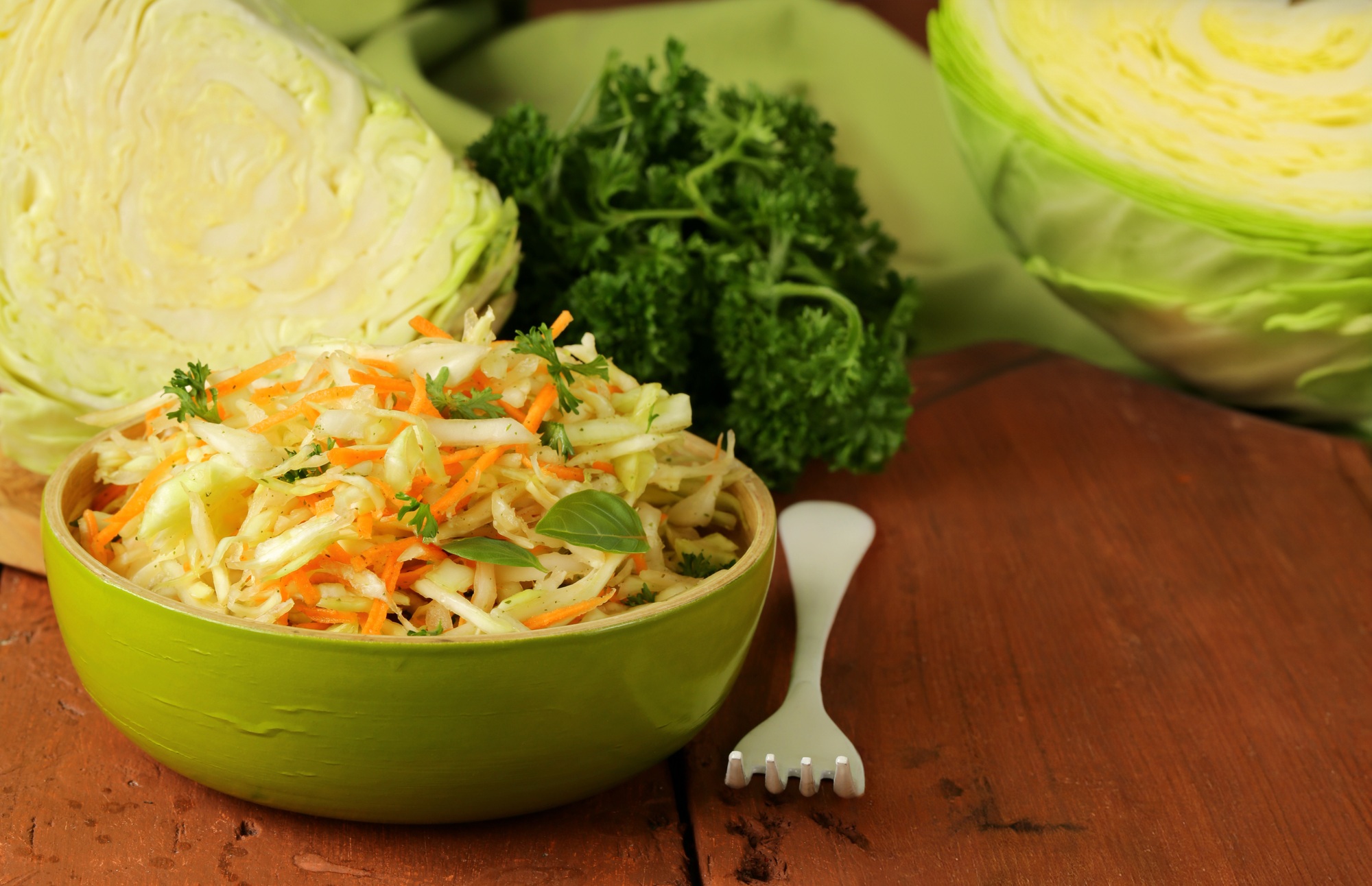 cabbage salad, coleslaw with herbs on the table