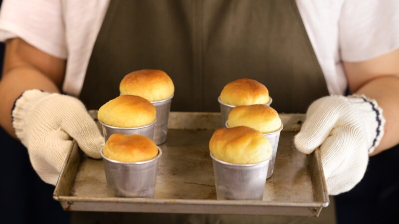 making rum baba ( baba au rhum ), traditional French and Italian dessert