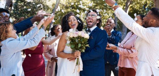 Wedding confetti, marriage couple and celebration of audience throwing flower petals outdoor. Happi
