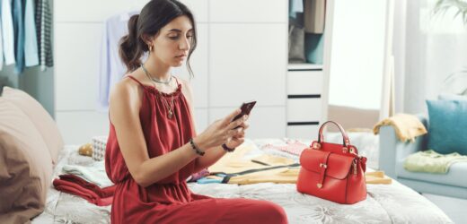 Stylish woman chatting with her phone